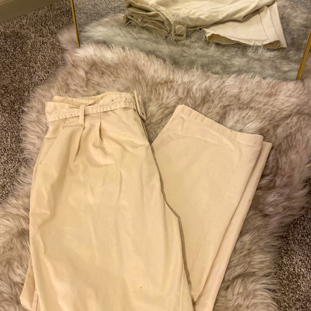 Super cute pair of straight-leg, tan dress pants with a matching belt!